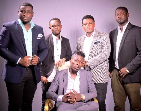 Shatta Wale and his management team.