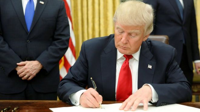 Donald Trump begins overhaul as first executive orders signed