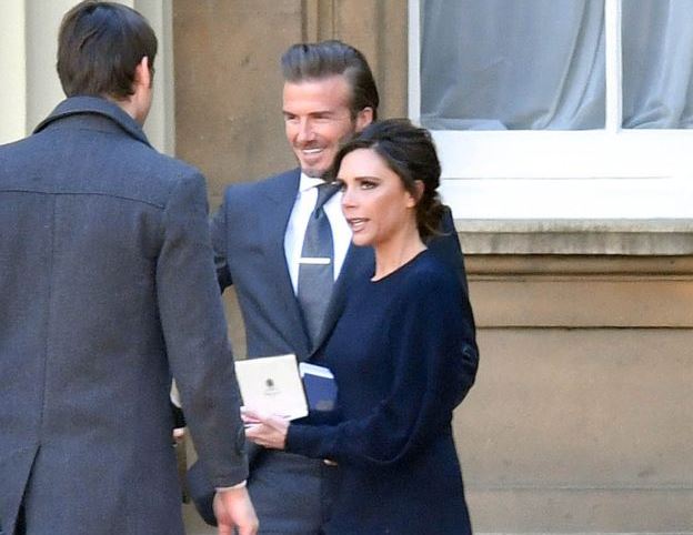 Victoria Beckham receives OBE from Prince William