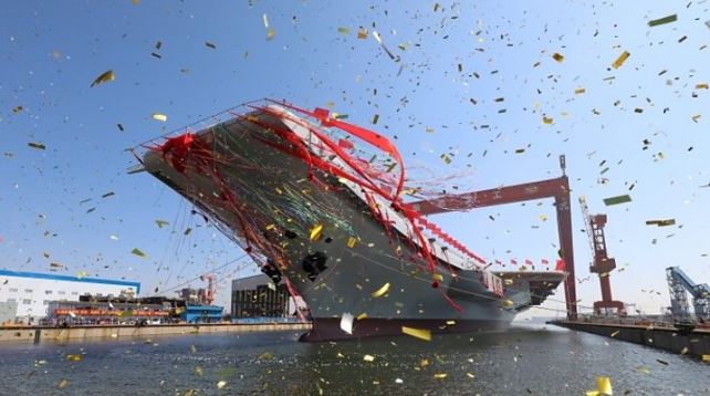 China launches aircraft carrier, boosting military presence