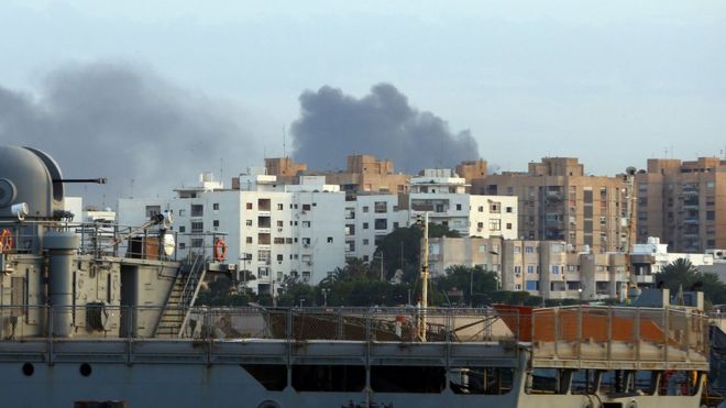 Libya turmoil: Rival armed groups clash in capital, Tripoli