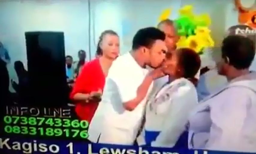 Nigerian pastor kisses female congregant to heal her [Video] – Don’t publish