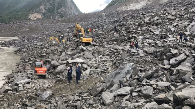 China landslide leaves at least 140 missing