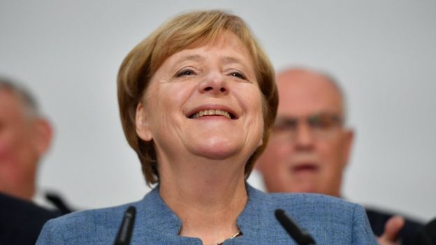 Germany elections: Merkel wins fourth term