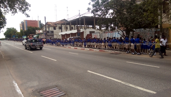 Pupils abandon classes to wave at Ouattara on the streets [Photos]