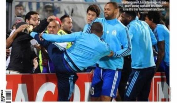 Marseille suspend Evra for kicking fan during warm-up