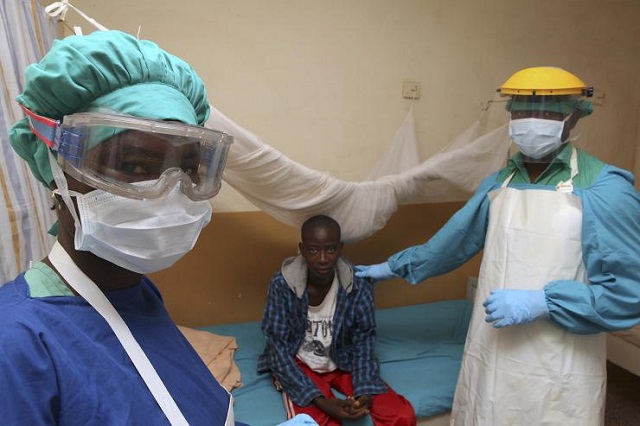 Doctors attend to a Lassa fever patient