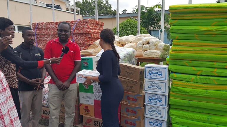 Kasapreko presents relief items to flood victims