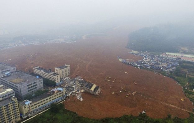 China landslide: Rescuers search for 91 people still missing