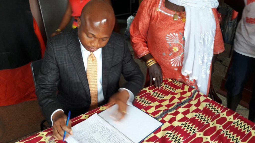 Dept. Education Minister, Samuel Okudzeto Ablakwa signing the petitition