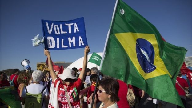 About 200 people gathered outside the Senate building in Brasilia to lend their support to Ms Rousseff.