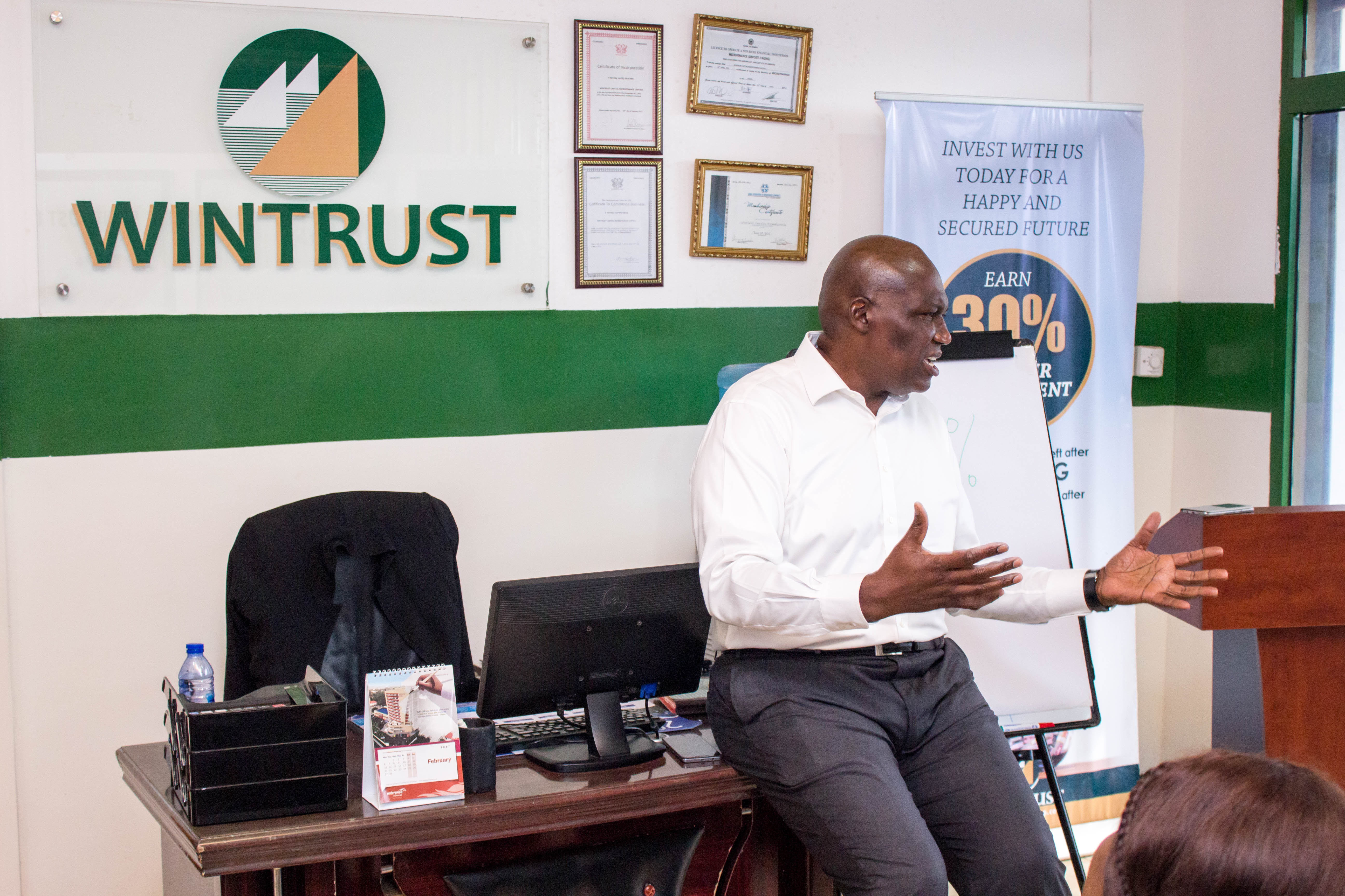 Ken Thompson interacts with Win Trust Microfinance Limited