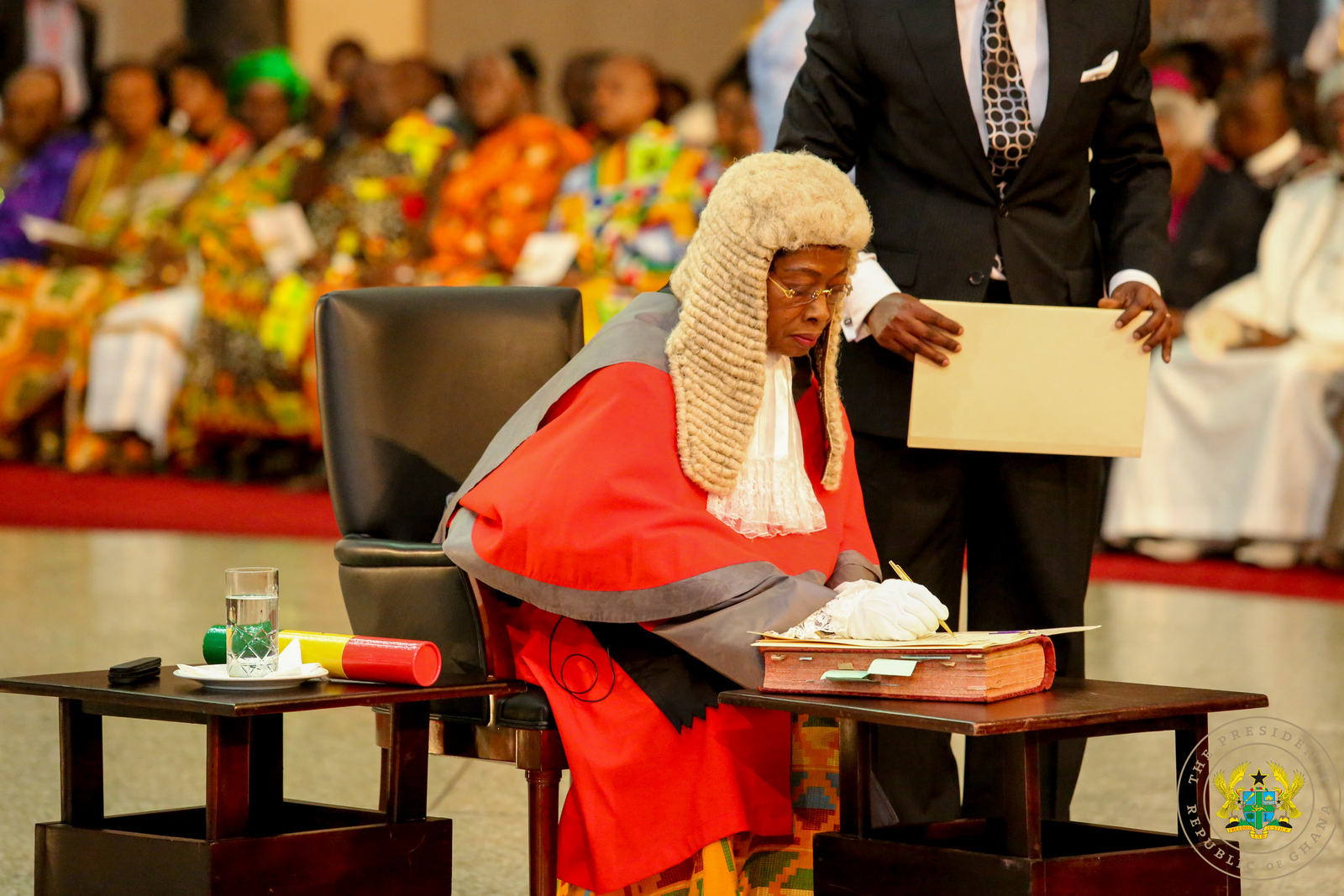 chief-justice-sophia-akuffo-signing-the-oath-book