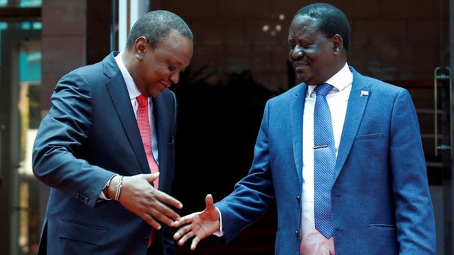 Raila Odinga (R) had refused to recognise Uhuru Kenyatta (L) as president